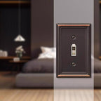 Amerelle 149TDB Chelsea Aged Bronze Bronze 1 gang Stamped Steel Toggle Wall Plate 1/Pack